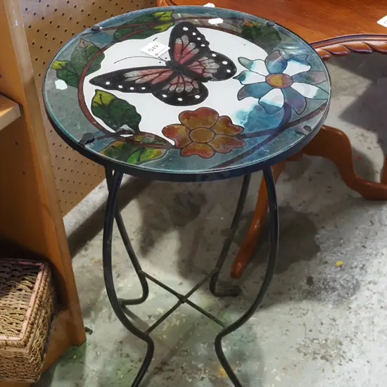 glass top butterfly and floral deocrated wine table