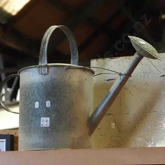 galvanised watering can