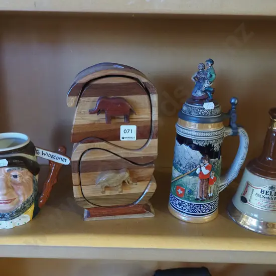 toby jug, beer stein, Bells whisky bottle, mixed timbers drawers H260