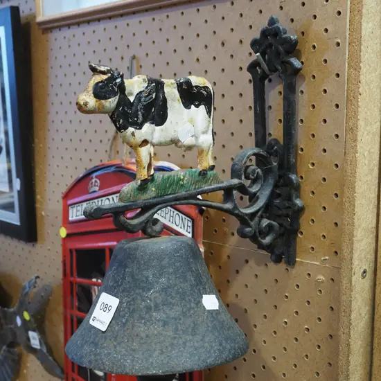 cast metal cow themed bell