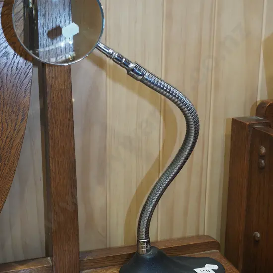 magnifying glass on stand