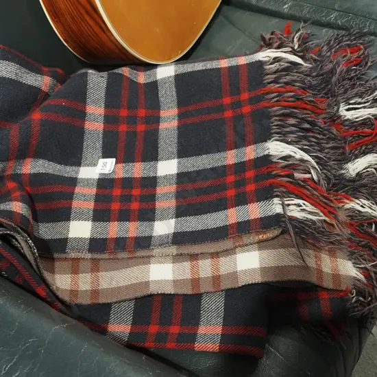 checked woollen travel blanket