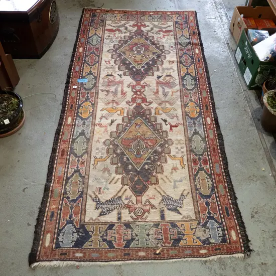 well worn woven floor mat - Sth American themed L1270 W1030