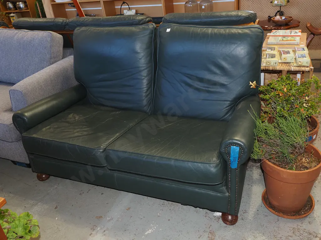 green leather 2 seater settee Image 1++