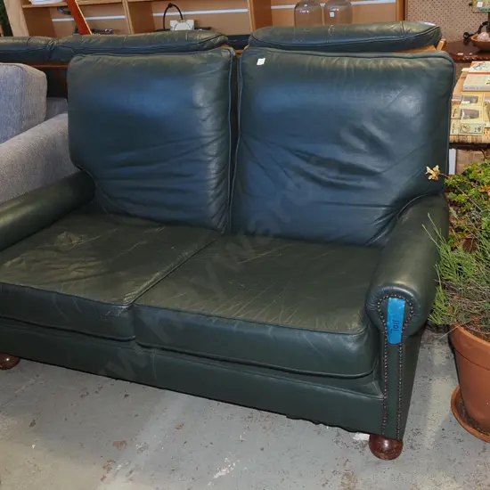 green leather 2 seater settee