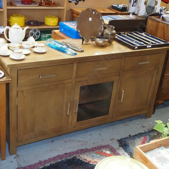 oak and pine sideboard with 2 solid doors, 1x glazed door, 3x drawers, chrome handles - excellent condiion