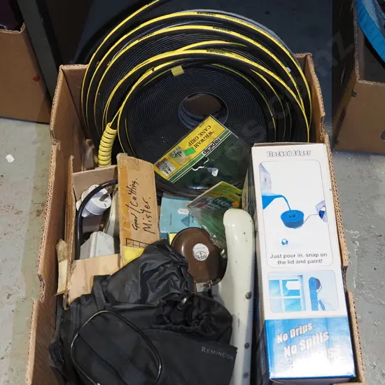 box; draught stop tape, stapler, water blaster hose etc