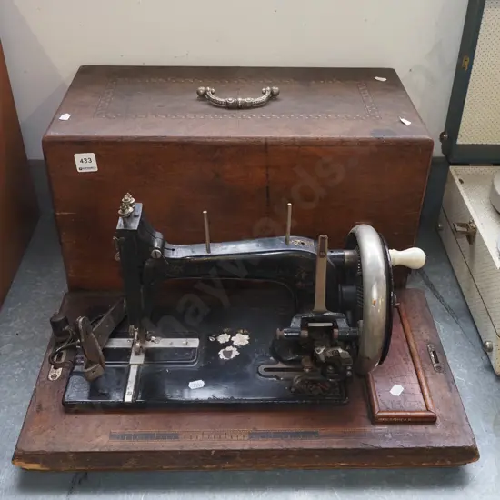 vintage hand crank table top sewing machine