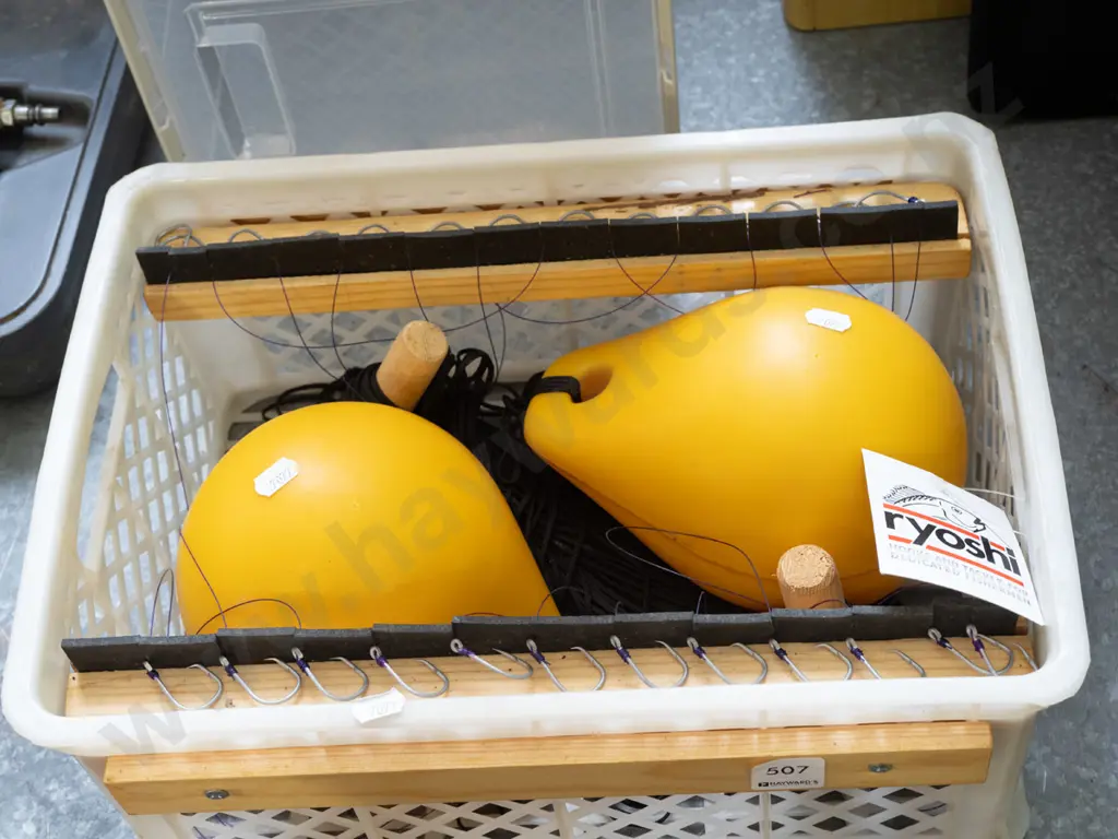 container of fishing hooks, lines, floats Image 1++
