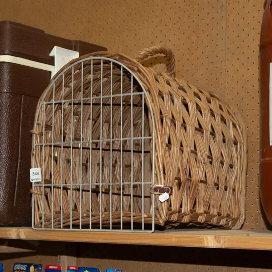 cane and metal pet carrier