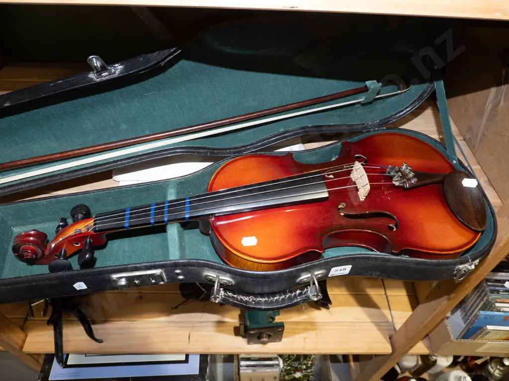 cased violin and bow Image 1++