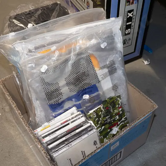 boxed exercise lumber support, CDs etc