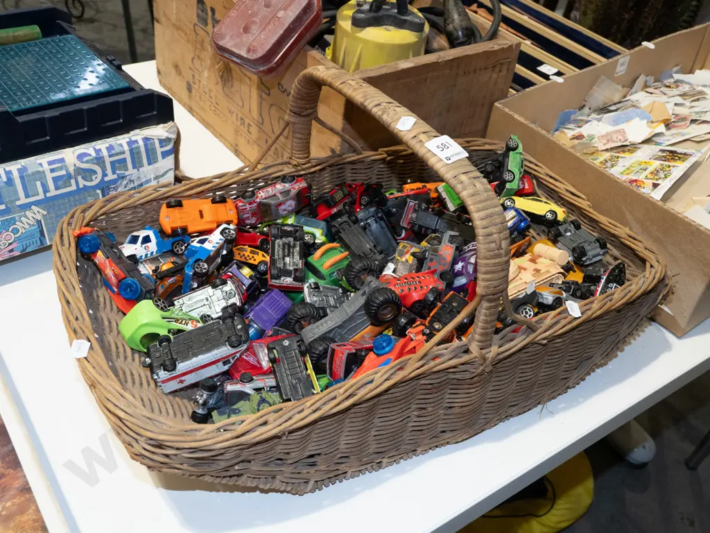 cane basket and toy vehicles Image 1++