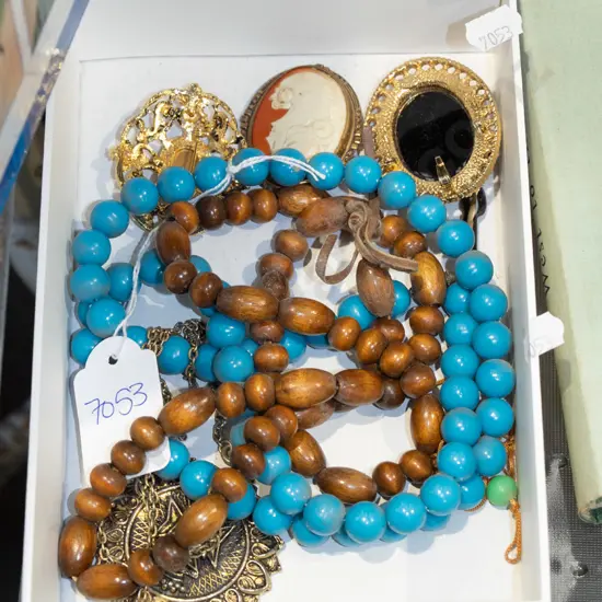 box; beaded necklaces, brooches