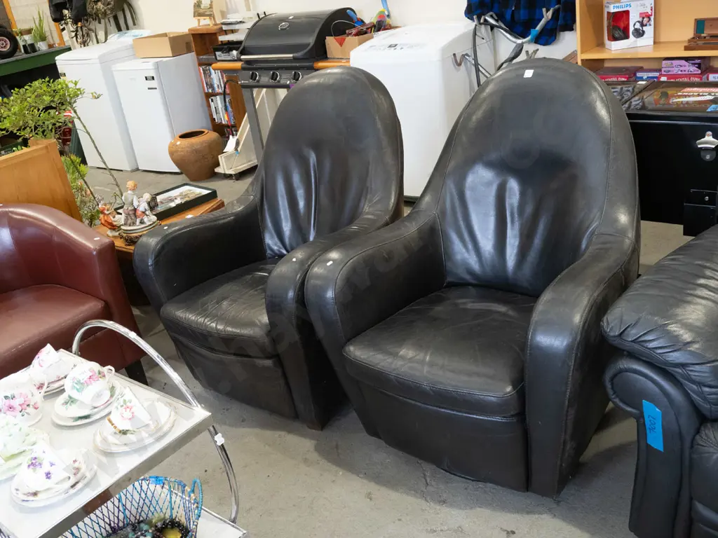 2x black leather armchairs - 1 rocking and swivel, 1 doesn't Image 1++