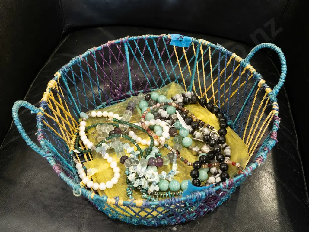 basket; costume necklaces Image 1++