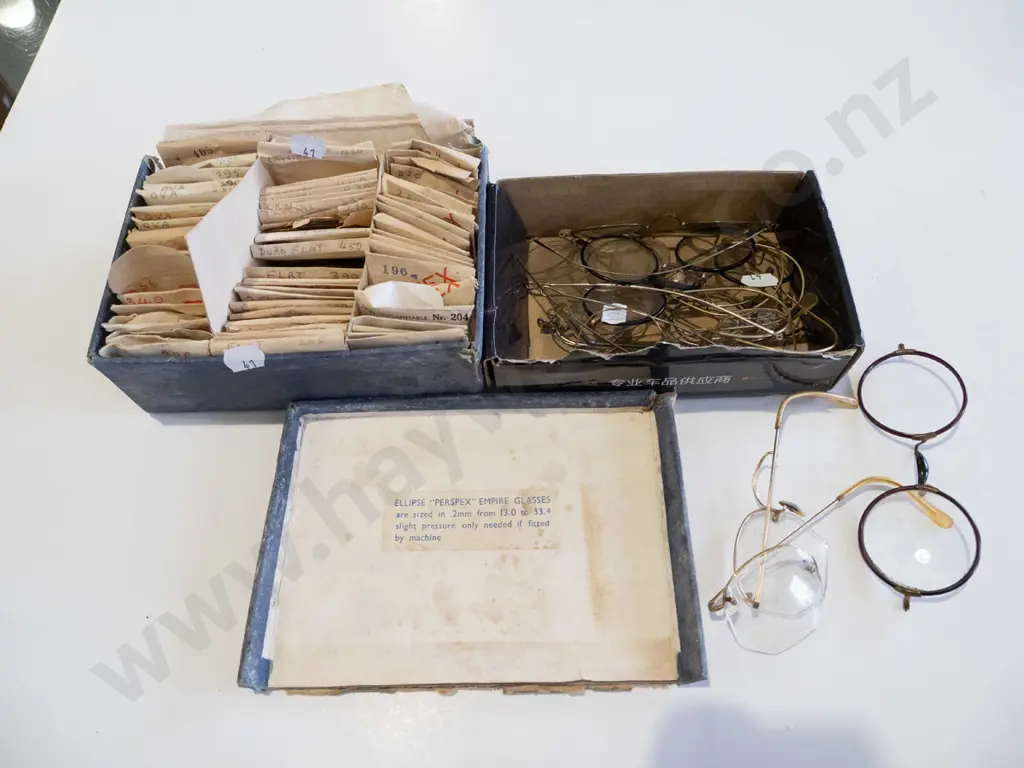 box of vintage eyeglasses, frames & part frames and a box of watch crystals Image 1++