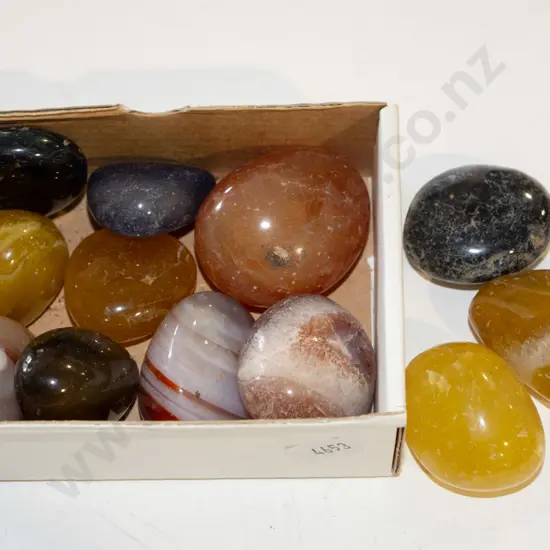 box of polished stones