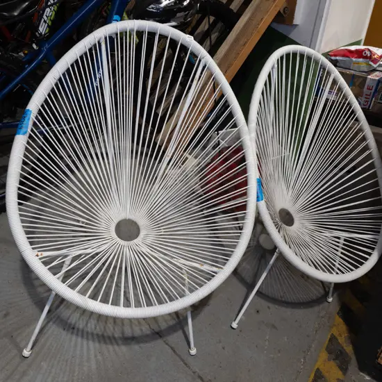 pair of plastic string outdoor chairs - slight rust