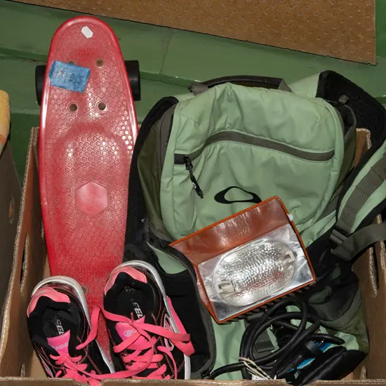box; skateboard, backpack, childs sneakers etc