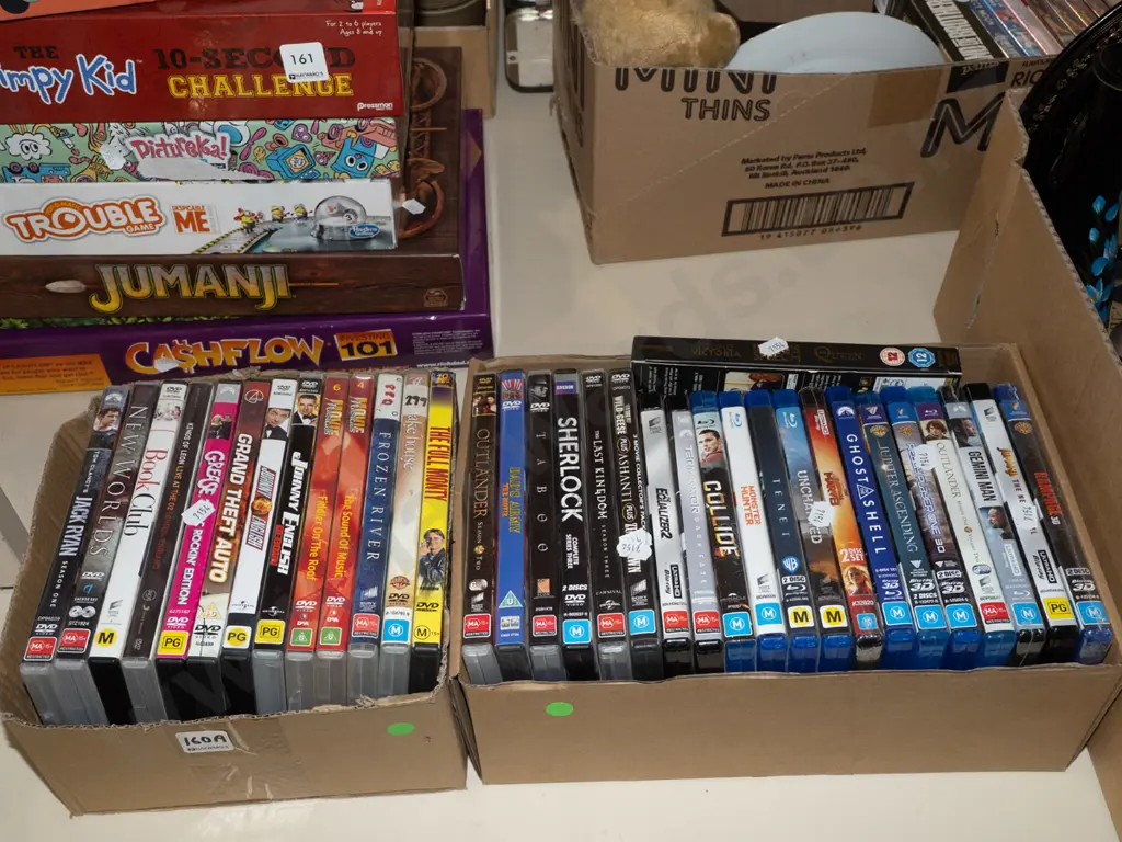2x boxes of DVDs Image 1++