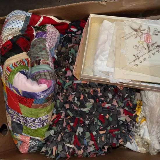 box; small rag rug, quilt, blanket etc