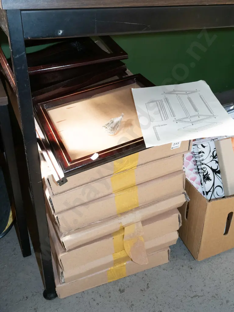7x boxes of yet to be assembled wood and glass stands Image 1++