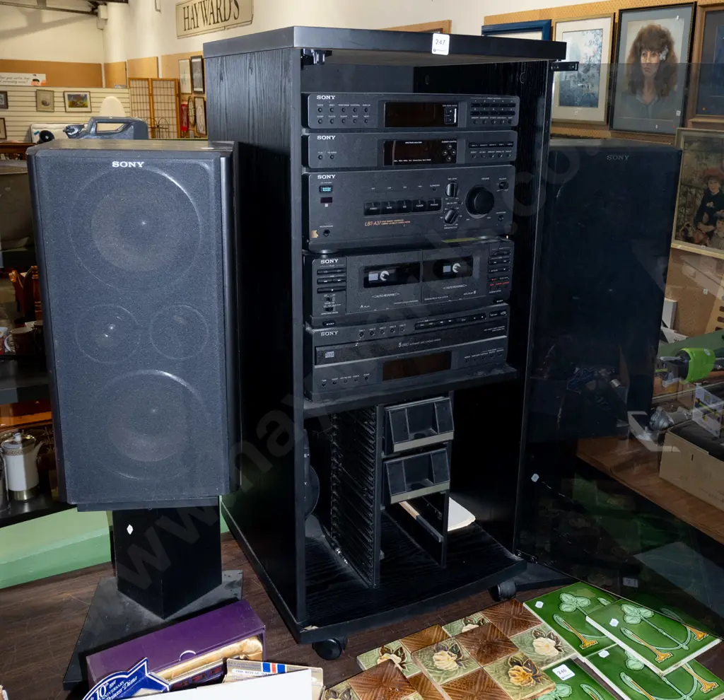 Sony stereo system in cabinet Image 1++