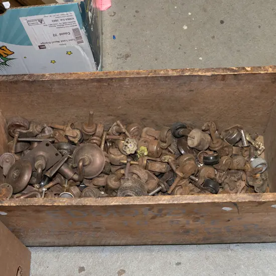 wooden box, numerous casters