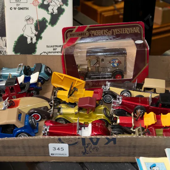 tray of toy vehicles