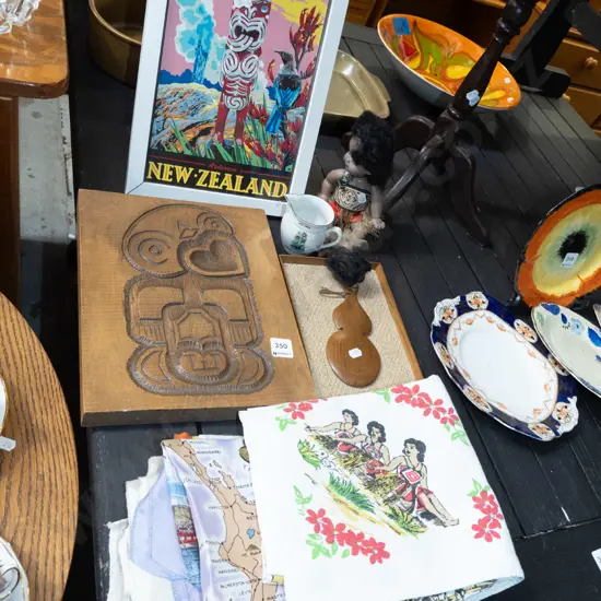 assorted NZ souvenir prints, doll, tablecloths  etc