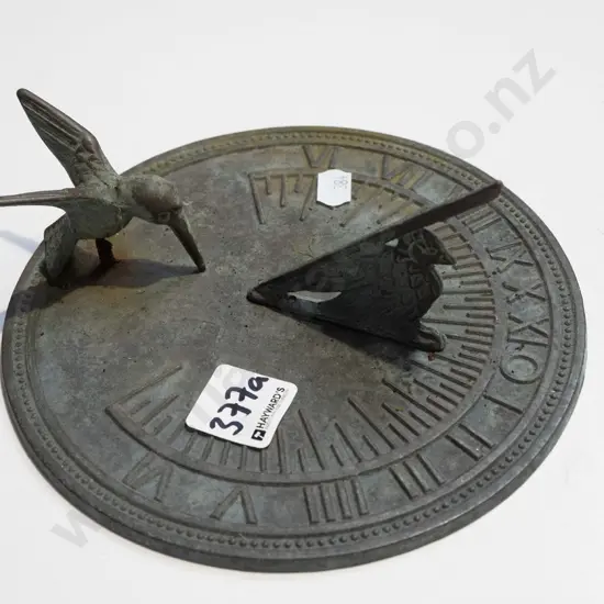 bird themed sun dial