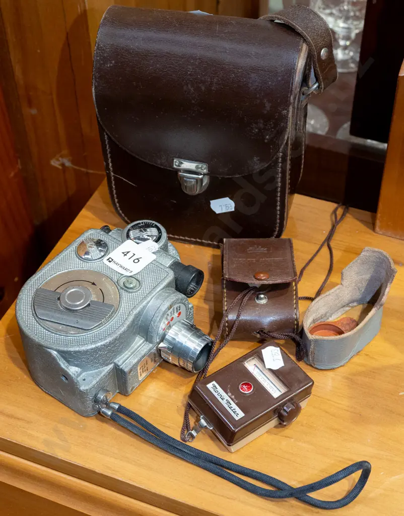 leather cased wind-up 8mm cine camera and light meter Image 1++