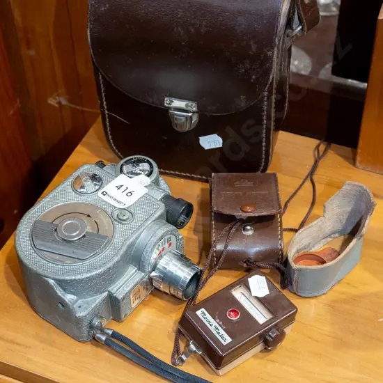 leather cased wind-up 8mm cine camera and light meter