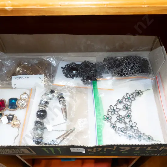 box of costume jewellery necklaces