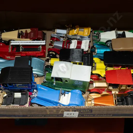 box of toy vehicles