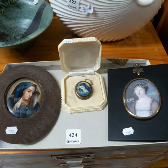 box; Mary prints, brooch, 1 other print