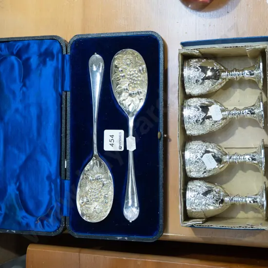 small plated goblets, salad servers in case