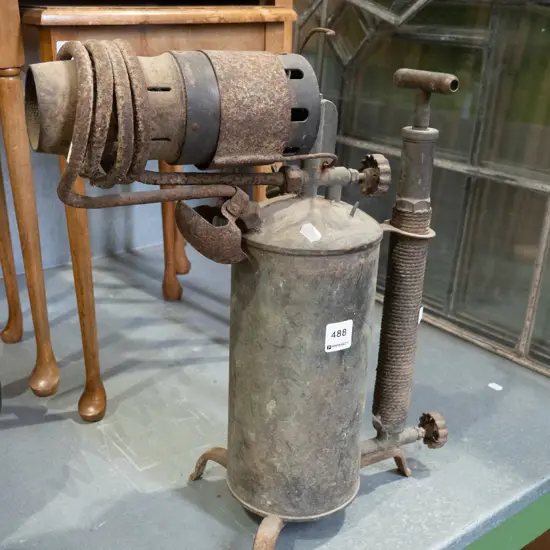 large and rusty blow torch H460
