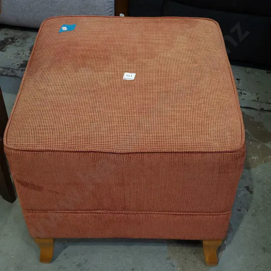orange ottoman - some staining