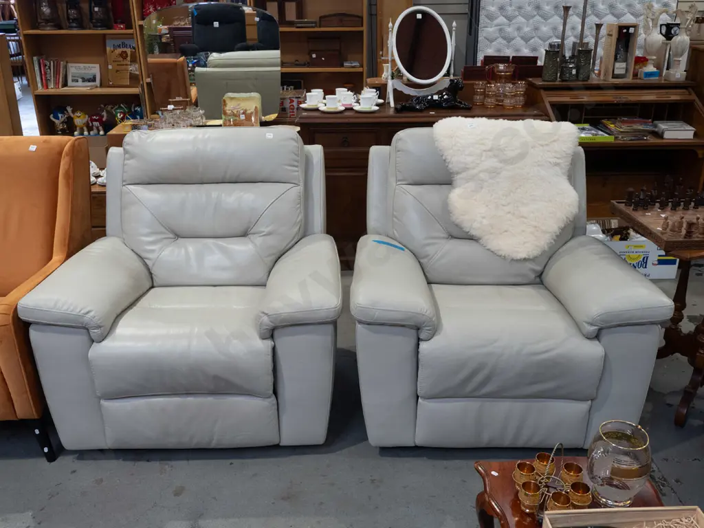 pair of cream/taupe leather upholstered reclining armchairs Image 1++