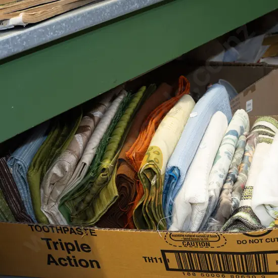 box of fabric pieces