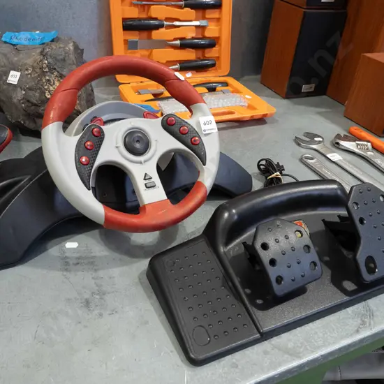 pc gamer car steering wheel and foot controls