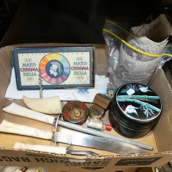 box; snakeskin, corkscrew, pencils etc