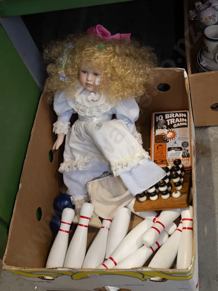 box; wooden skittles, porcelain doll, various games Image 1++