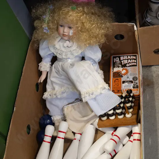 box; wooden skittles, porcelain doll, various games