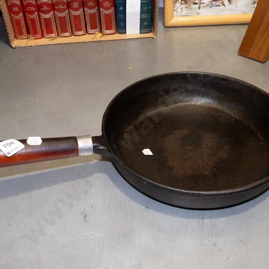 cast iron wooden handled frying pan