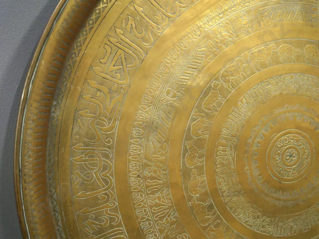 large brass tray with pressed & incised designs - some dents. Diameter 600 Image 1++