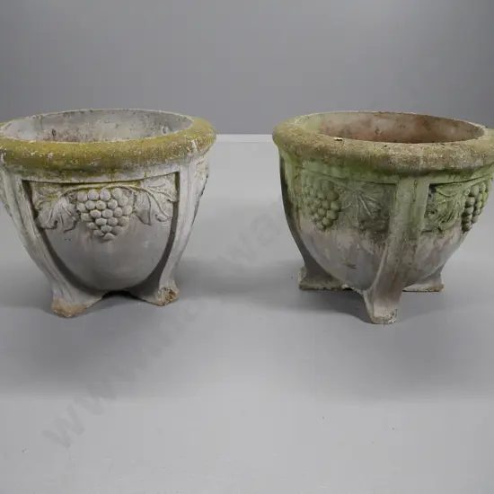 pair of large cast concrete grape pattern garden urns - one has chip to foot H-400 Diameter 500