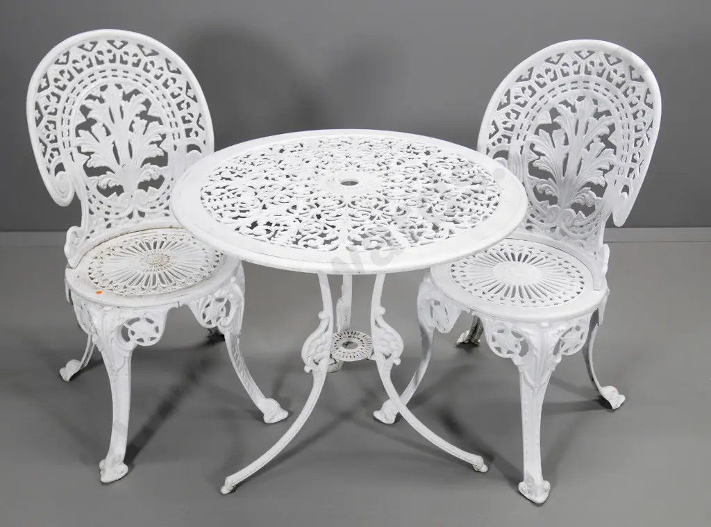 cast aluminium outdoor table and 2 chairs H-640 Diameter 680 Image 1++